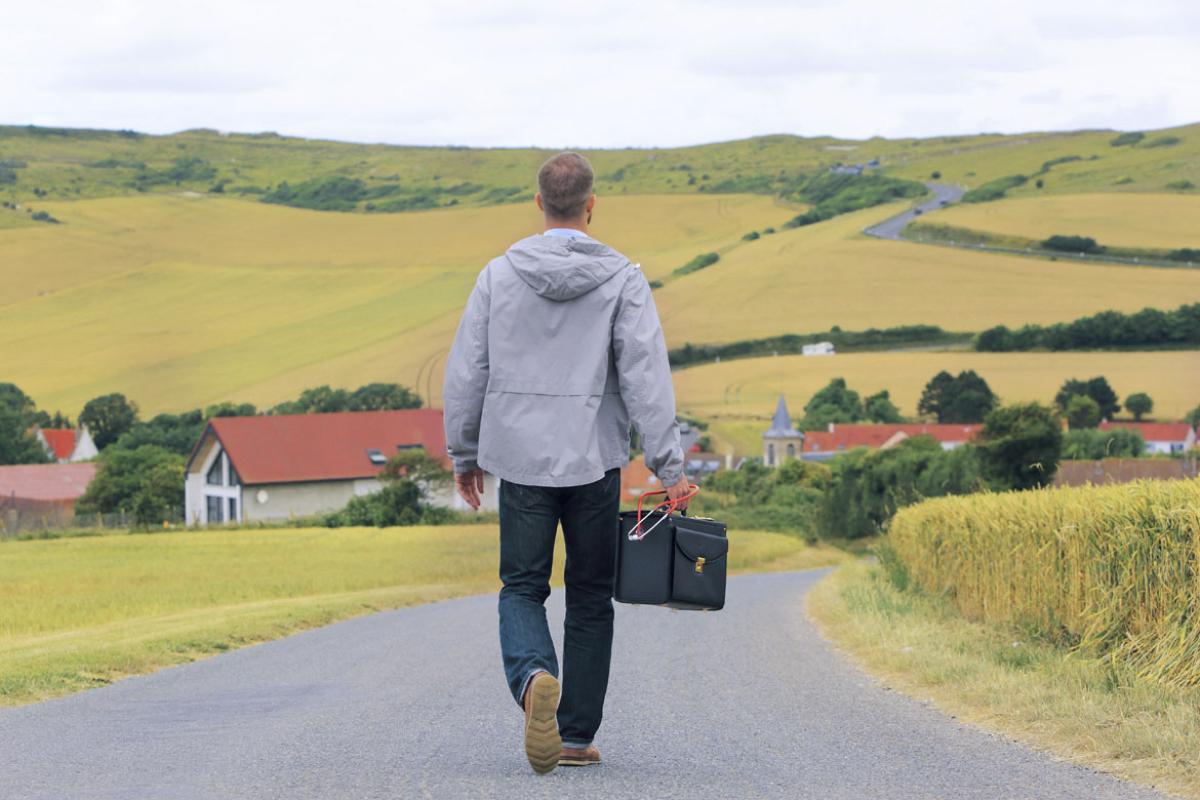 Person walking on a rural road